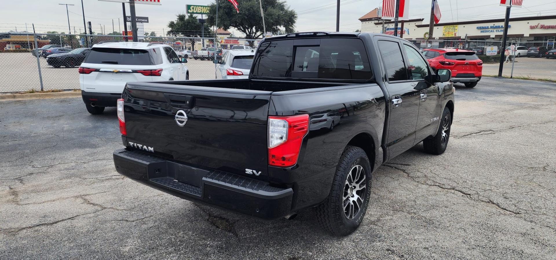 2021 Black Nissan Titan S Crew Cab 2WD (1N6AA1EEXMN) with an 5.6L V8 DOHC 32V engine, 9A transmission, located at 1842 Wirt Road, Houston, TX, 77055, (713) 973-3903, 29.805330, -95.484787 - Photo#4